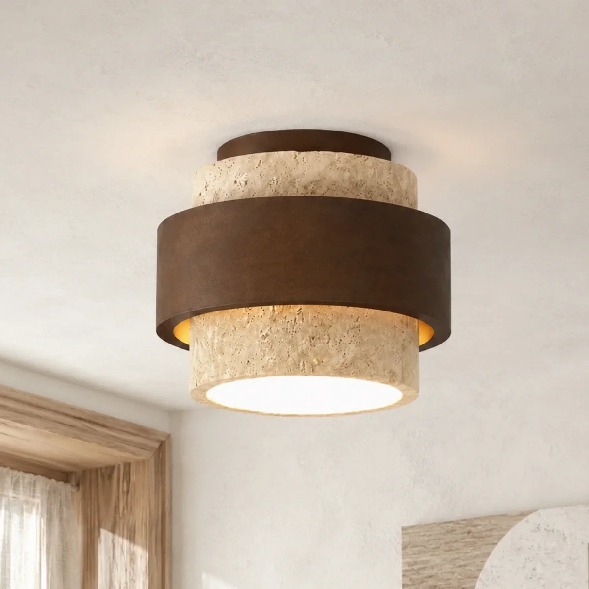 Travertine flush mount ceiling light with dark walnut wood banding studio view