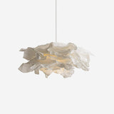 Studio photo of the white paper pendant shade lit on a plain background