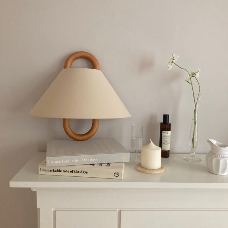 First colour option of the pleated fabric wall sconce on white
