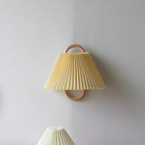 Fabric wall sconce shown in a further colour option