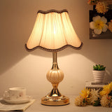 Gold base vintage lamp with plain pleated white fabric shade