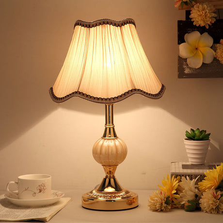 Gold base vintage lamp with plain pleated white fabric shade