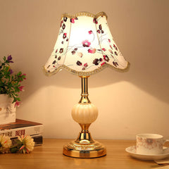 Gold base lamp with purple and burgundy floral print shade