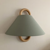 Fabric wall sconce shown in one of six colour options