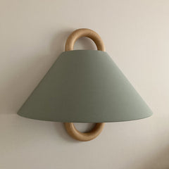 Fabric wall sconce shown in one of six colour options