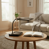 Magnifying desk lamp shown with adjustable gooseneck and freestanding base