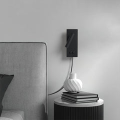 Bedside wall light with spotlight and separate backlight lit