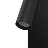 Plug-in wall reading light with visible cord to a socket