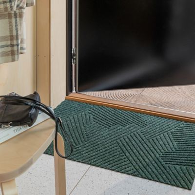 Textured outdoor mat for front door made from recycled materials