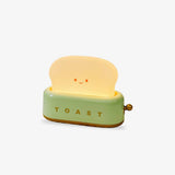 Retro toaster rechargeable table lamp with glowing toast shade
