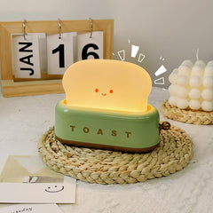 Toaster table lamp side view with brass lever knob