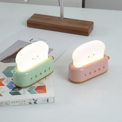Toaster table lamp dimmed low as a bedside night light