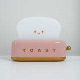 Cordless rechargeable toaster lamp on a nightstand