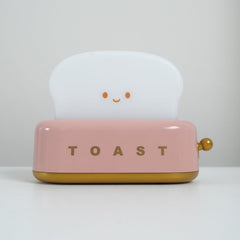 Cordless rechargeable toaster lamp on a nightstand