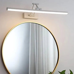 Adjustable vanity light bar tilted to aim light at the sink