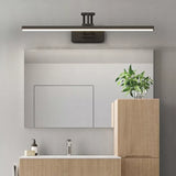 Wall-mounted LED vanity light casting an even wash of illumination
