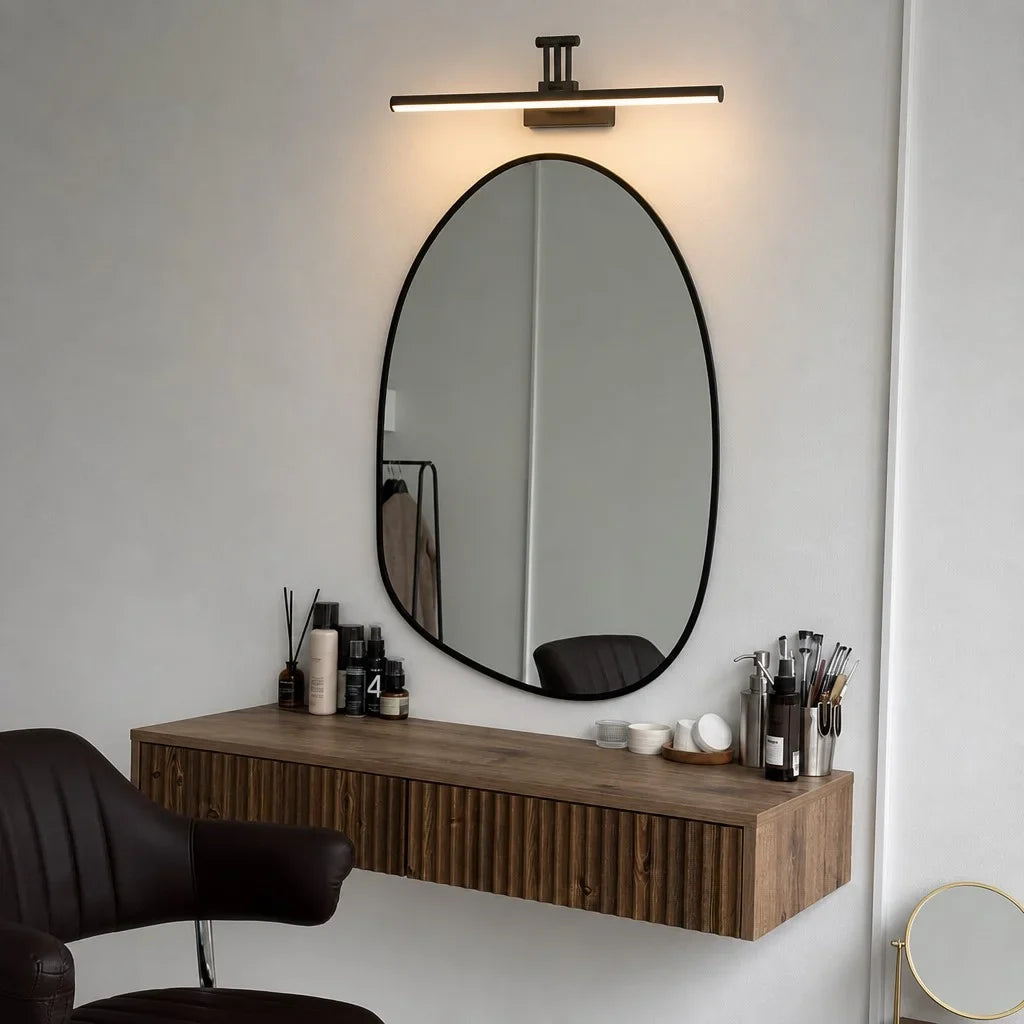 Minimalist over-mirror bathroom light with a long even glowing bar