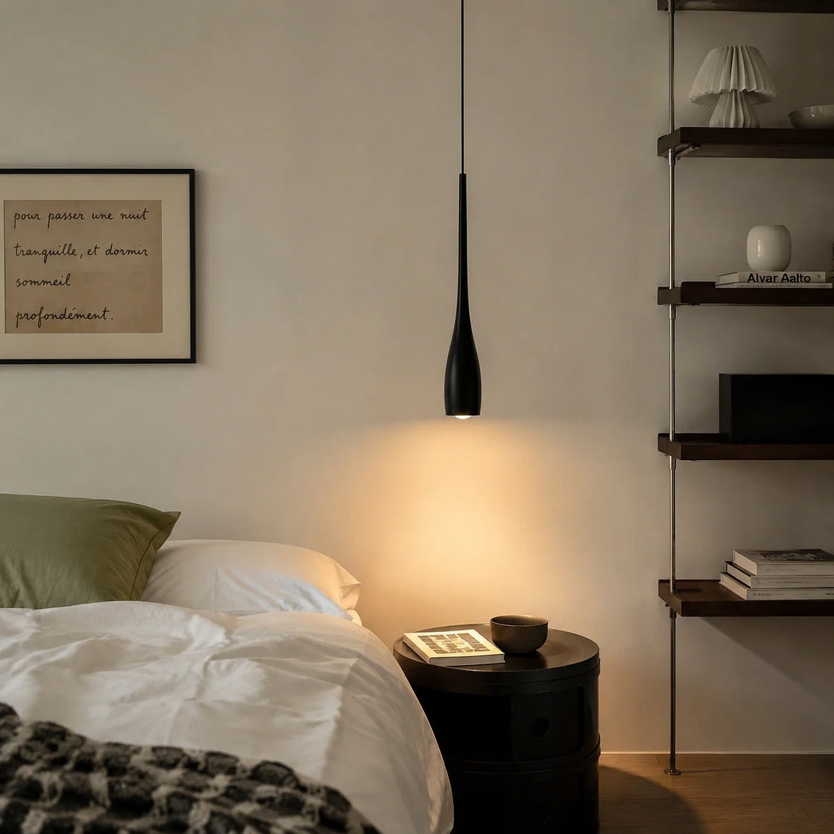 Minimalist teardrop pendant light viewed from a front angle