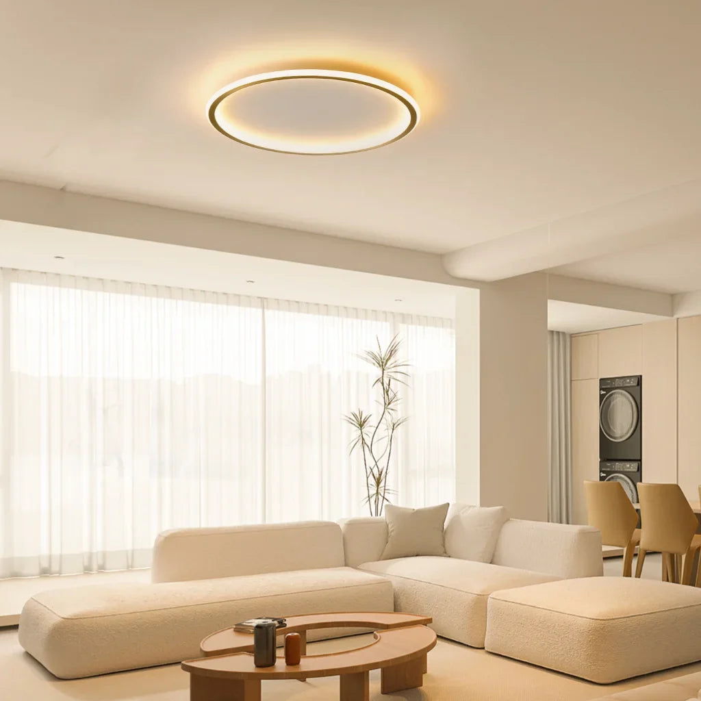 White flush mount LED ring light mounted flat to a ceiling
