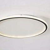 Close view of the round ceiling light rim showing even LED illumination
