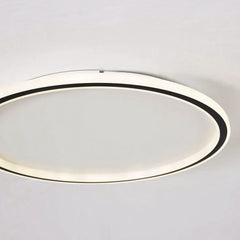Close view of the round ceiling light rim showing even LED illumination