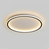 Round LED flush mount ceiling light shown against a plain ceiling