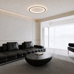 Slim round ceiling light with warm integrated LED glow around the rim