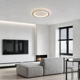 Minimalist ring ceiling light lit with soft ambient white light