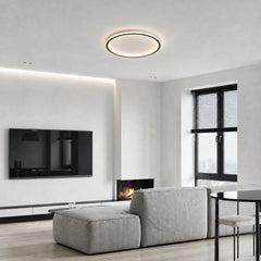 Minimalist ring ceiling light lit with soft ambient white light