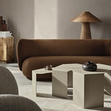 Abstract black metal nesting tables used as compact side table set