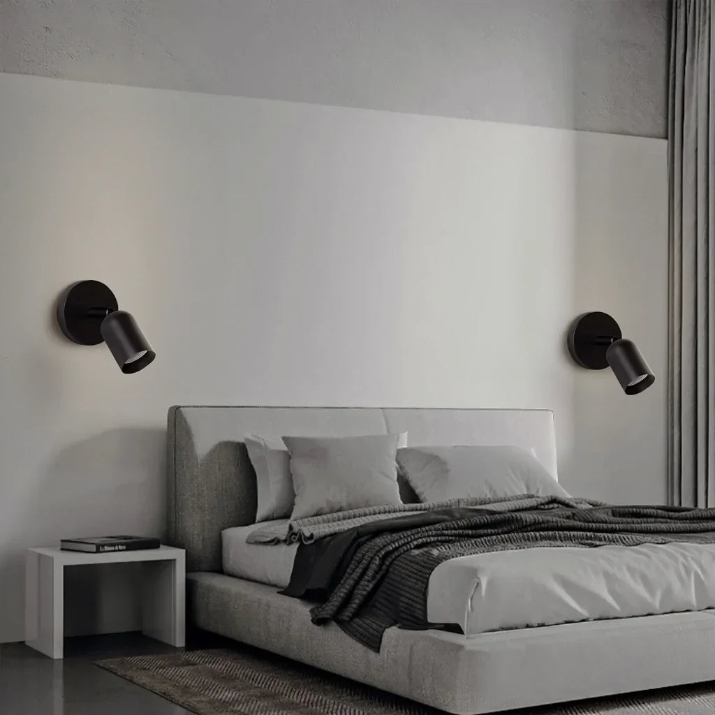 Adjustable LED wall sconce shown with shade pointed straight outward