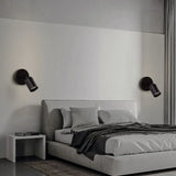 Adjustable LED wall sconce shown with shade pointed straight outward