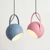 Adjustable ball metal pendant light with a pivoting yoke bracket