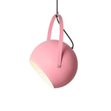 Adjustable pendant light showing the pivoting mount and hanging cable