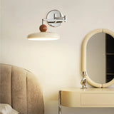 Adjustable wall lamp extended fully to show the reach of the arm