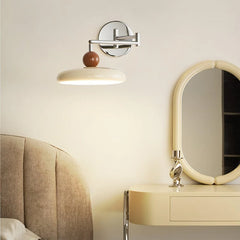 Adjustable wall lamp extended fully to show the reach of the arm