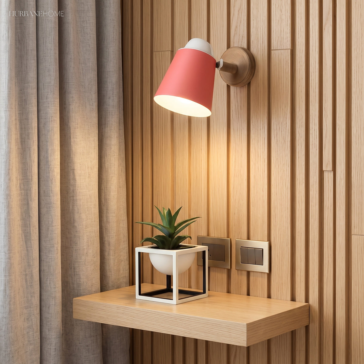 Pink sconce lit on slatted timber above a small plant shelf