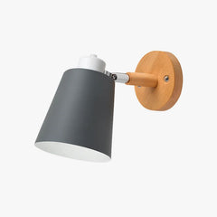 Grey sconce on a wooden arm shown against a plain backdrop