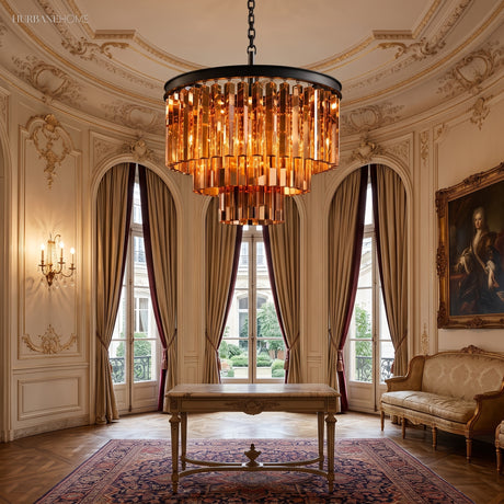 Amber crystal chandelier with black frame lit in an ornate classical living room