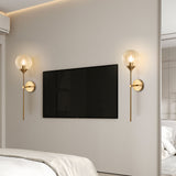 Amber glass globe wall sconce close view of the shade