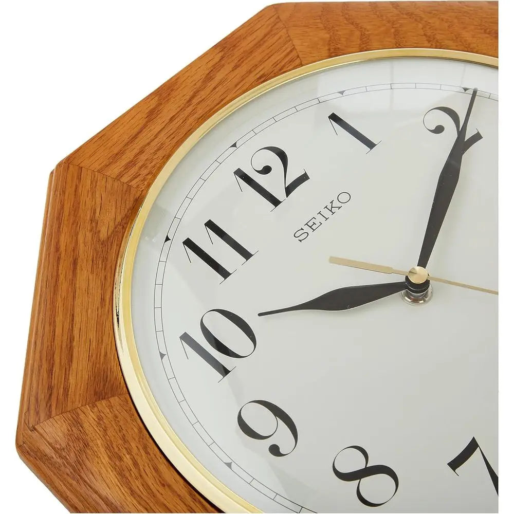 Analog Wall Clock – Seiko Traditional Octagonal Oak Design with Gold Bezel.