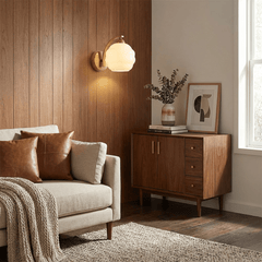 Indoor wall sconce with an iron body and opal glass globe, view 6