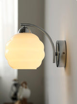 Art Deco opal glass globe wall sconce with a curved metal arm, view 19