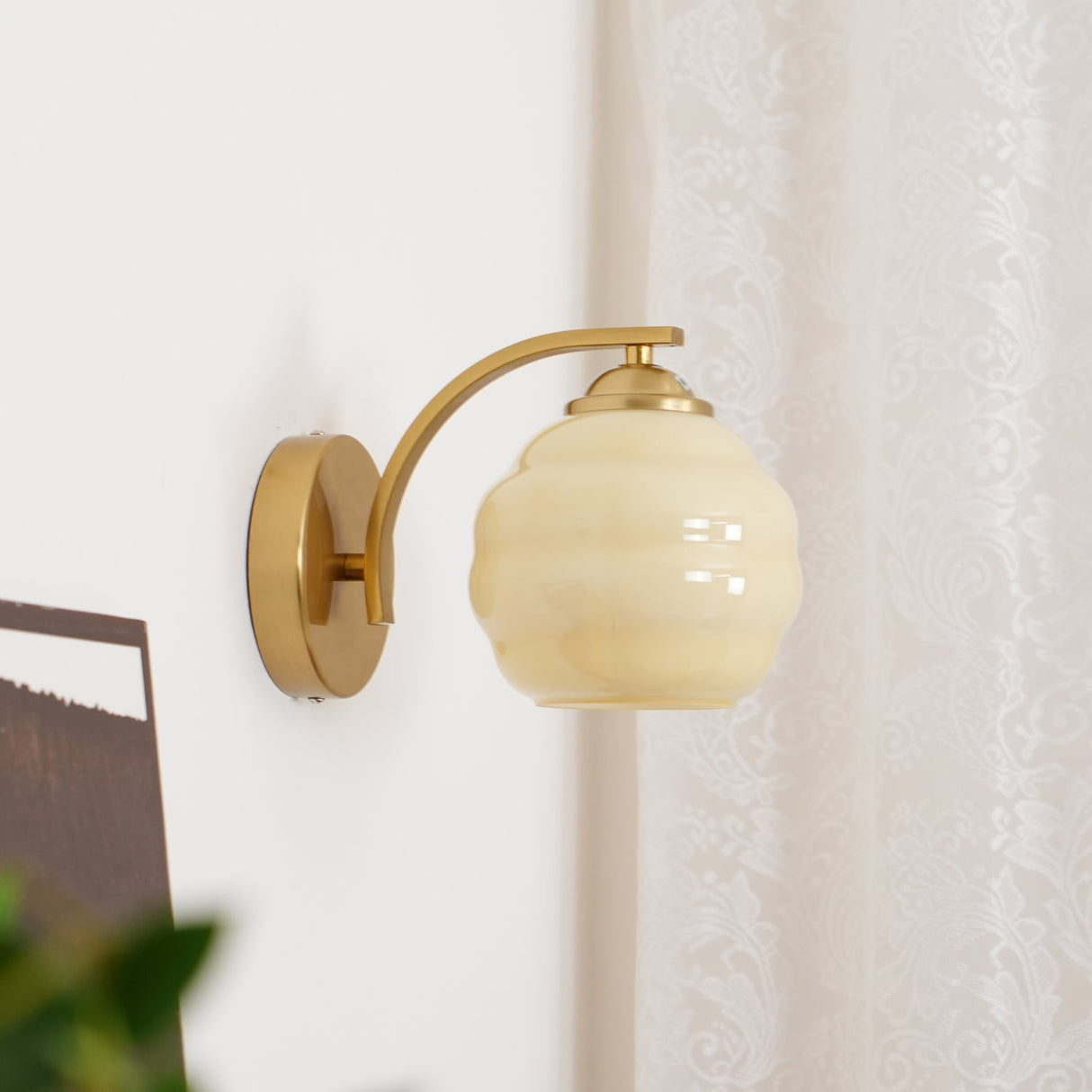 Hardwired E26 glass globe wall sconce in a gold and white finish, view 23