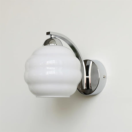 Frosted glass wall sconce with a chrome arm and round plate, view 27
