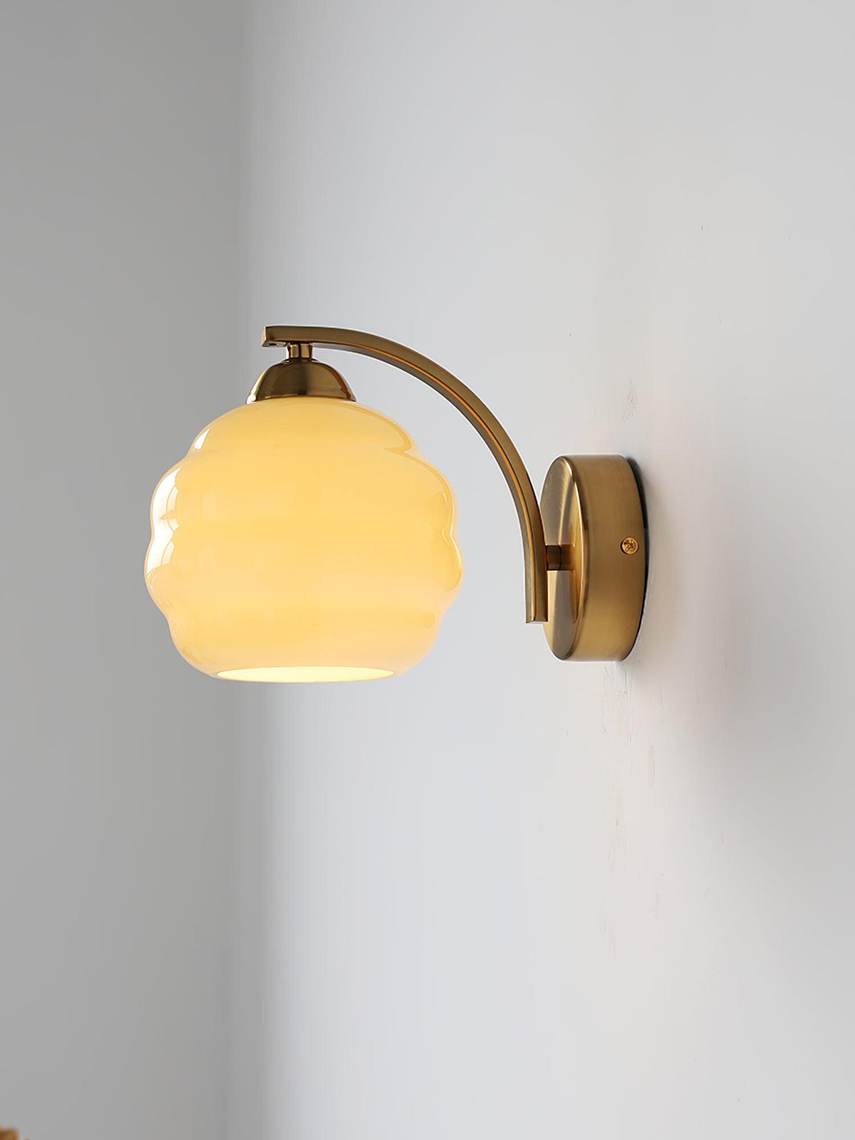 Frosted glass wall sconce with a chrome arm and round plate, view 39