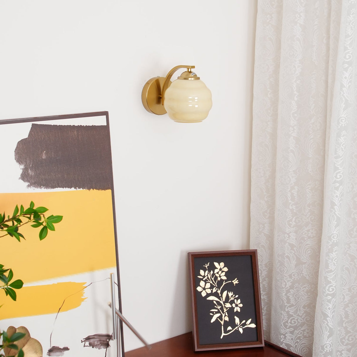 Frosted glass wall sconce with a chrome arm and round plate, view 45