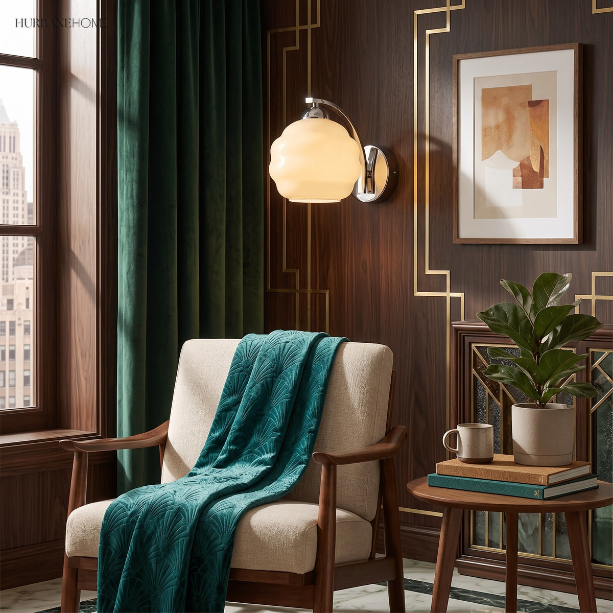 Glass globe wall sconce above a chair beside framed art and plant
