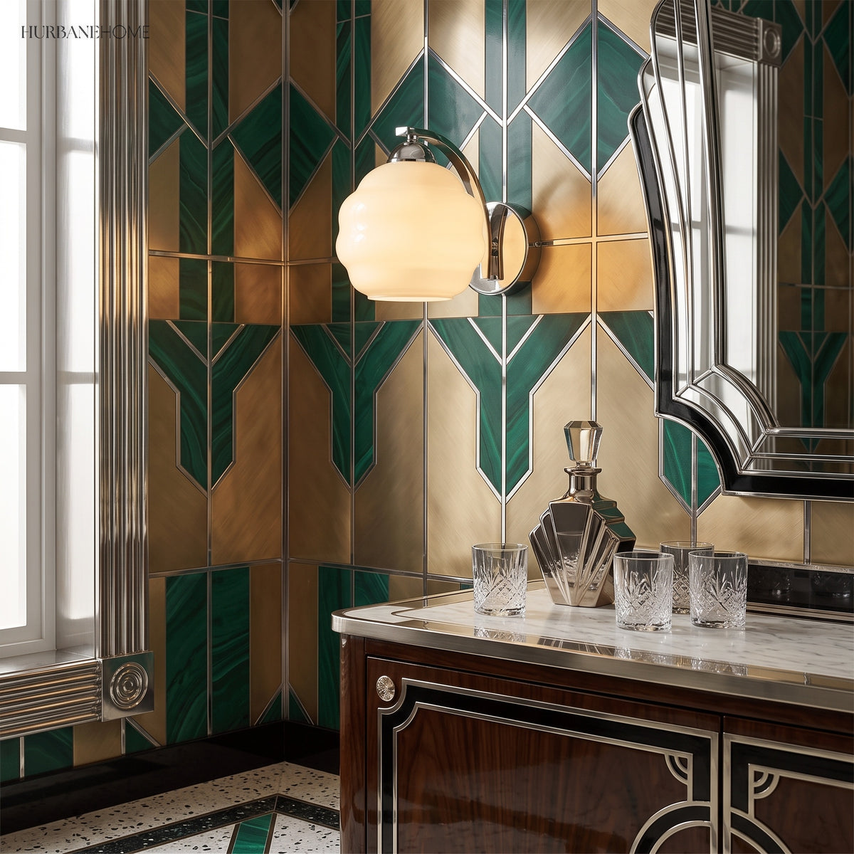 Chrome and opal glass sconce on green and gold geometric tiled wall