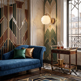Gold arm glass globe sconce lighting a blue velvet chaise lounge